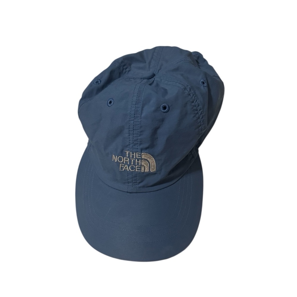 The North Face light blue hat with white accents in great condition, one size.